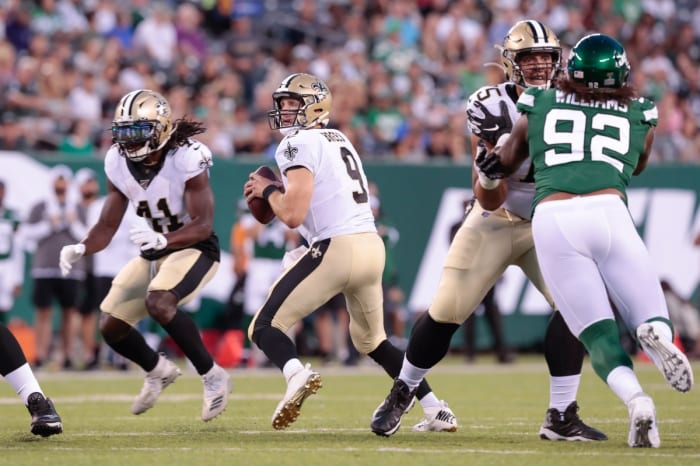 New Orleans Saints quarterback Drew Brees (9) drops back to pass against the New York Jets. Mandatory Credit: Vincent Carchietta-USA TODAY
